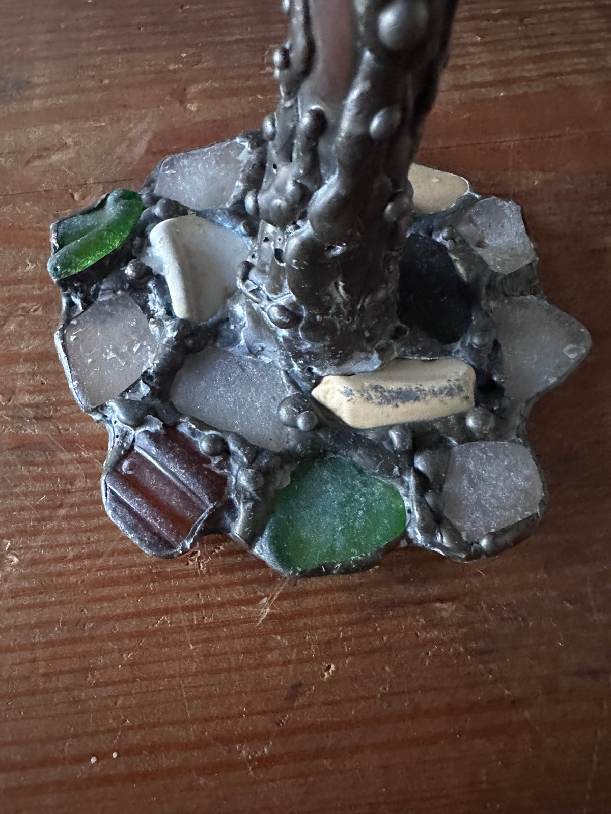 Stone encrusted candlestick