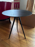 Three legged steel side table