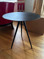 Three legged steel side table