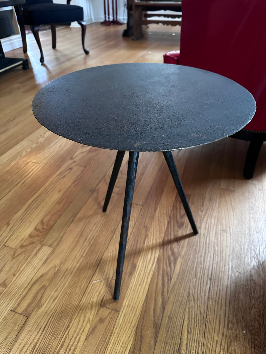 Three legged steel side table