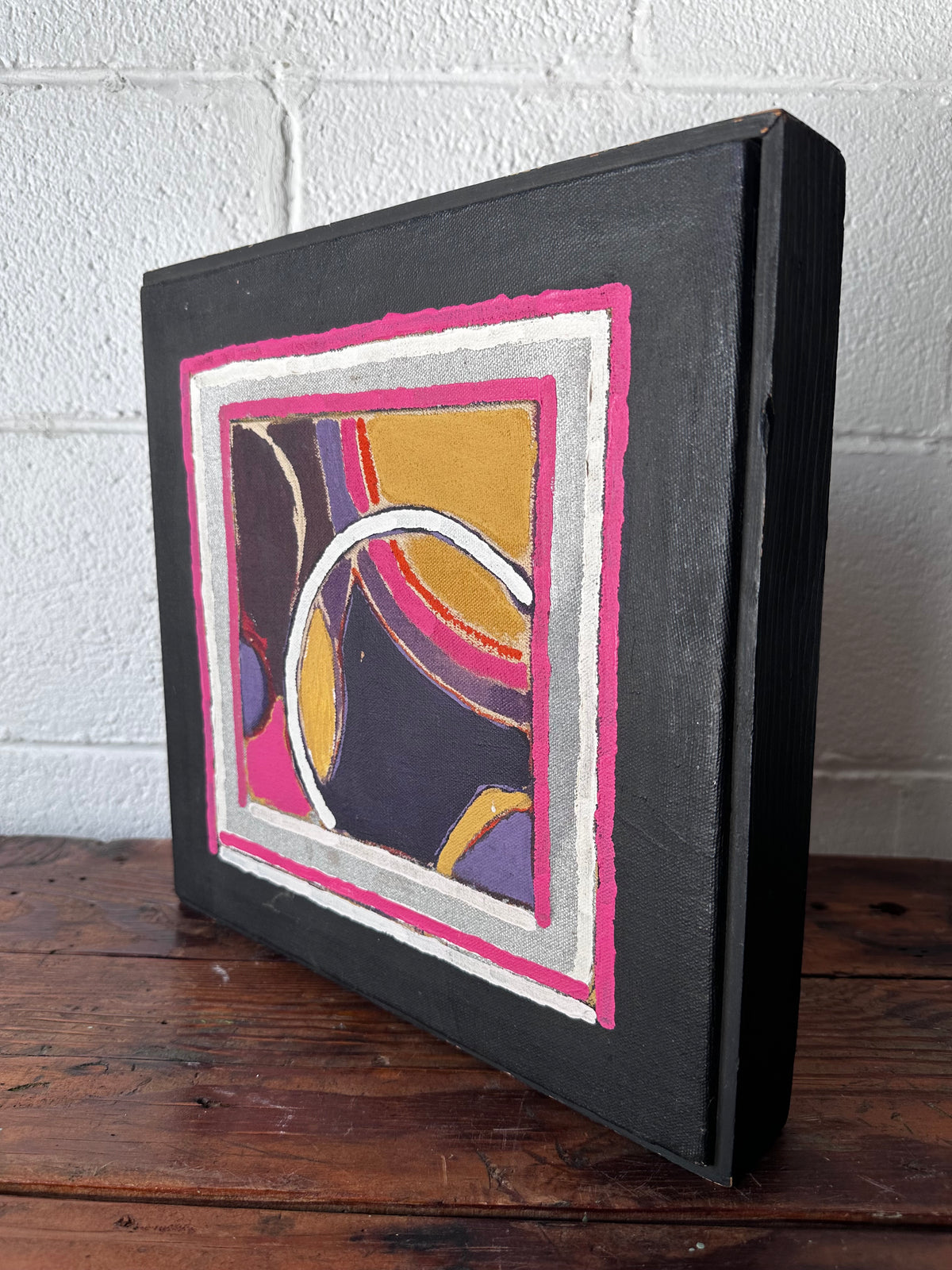 Geometric painting in pink, silver and gold