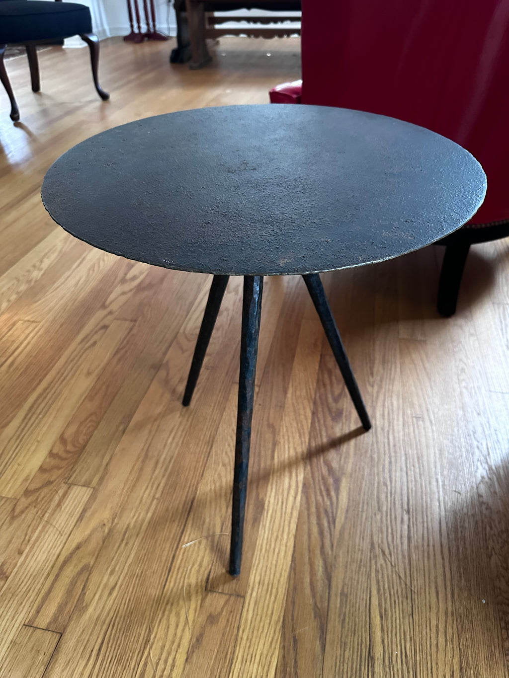 Three legged steel side table