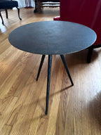 Three legged steel side table