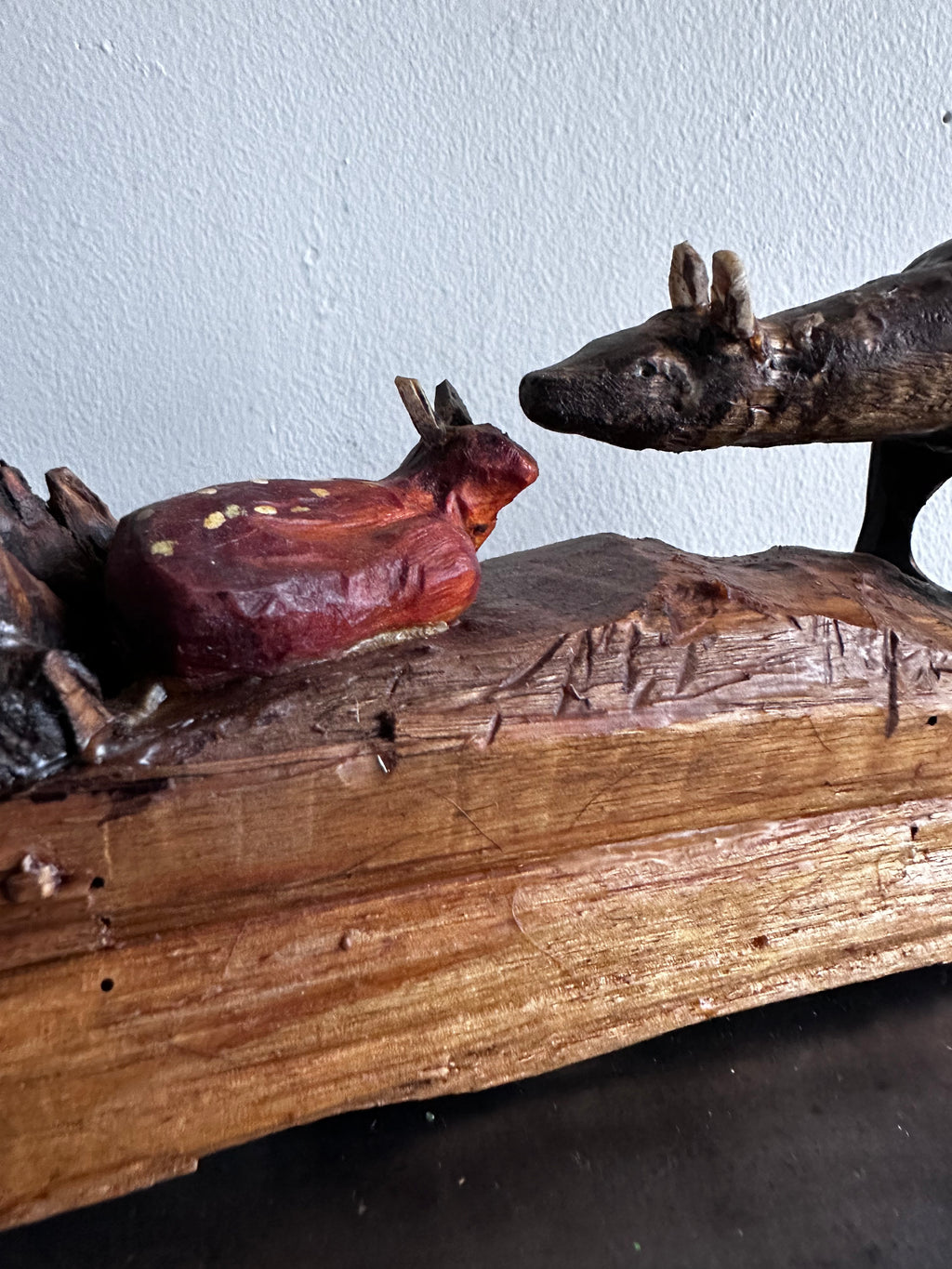 Carved wooden deer with fawn