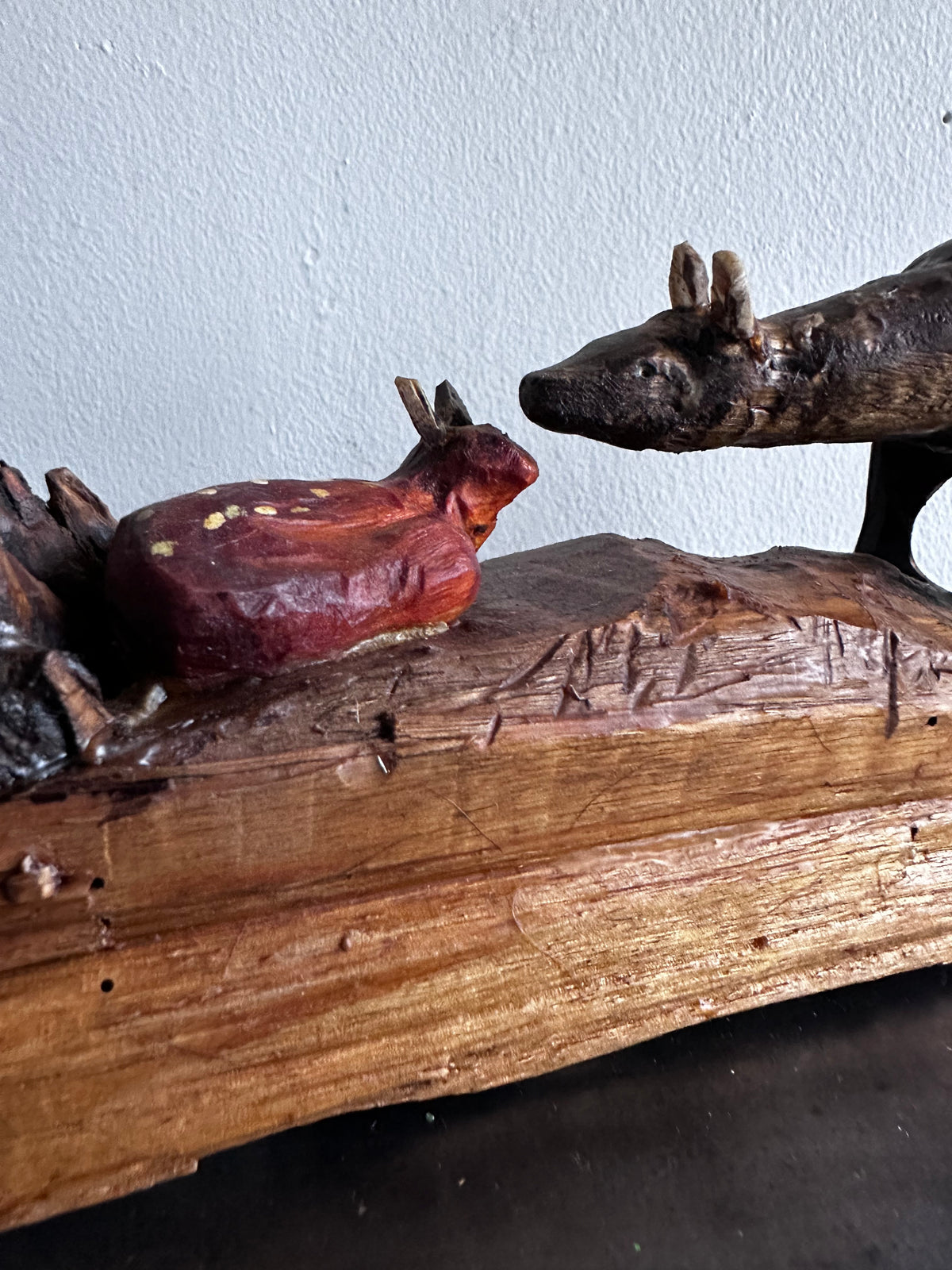 Carved wooden deer with fawn