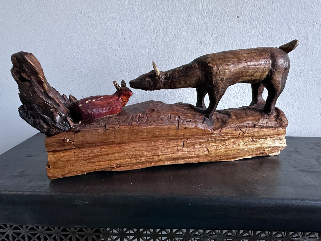 Carved wooden deer with fawn
