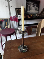 Stone encrusted candlestick