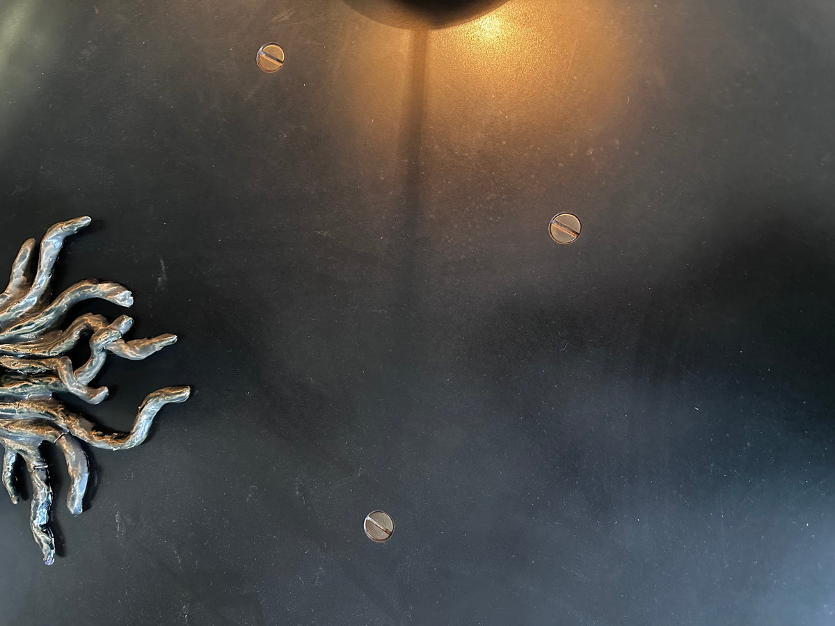 Steel top cocktail table