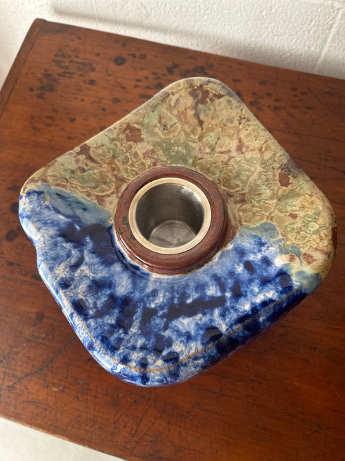 Blue and tan ceramic vessel