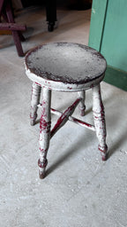 Gray and Red Milking Stool