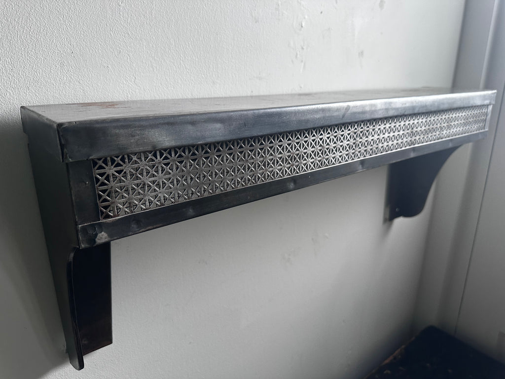 Stamped steel radiator shelf