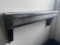 Stamped steel radiator shelf