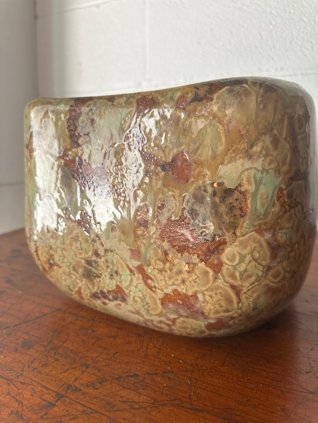 Blue and tan ceramic vessel