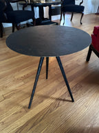 Three legged steel side table