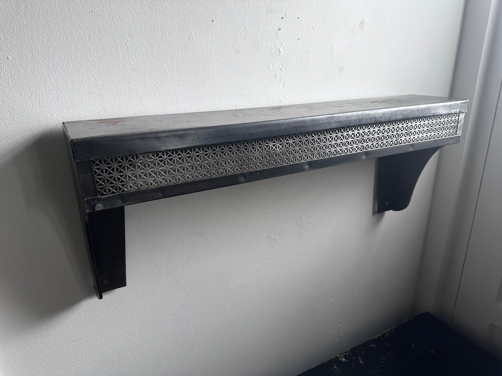 Stamped steel radiator shelf