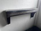 Stamped steel radiator shelf