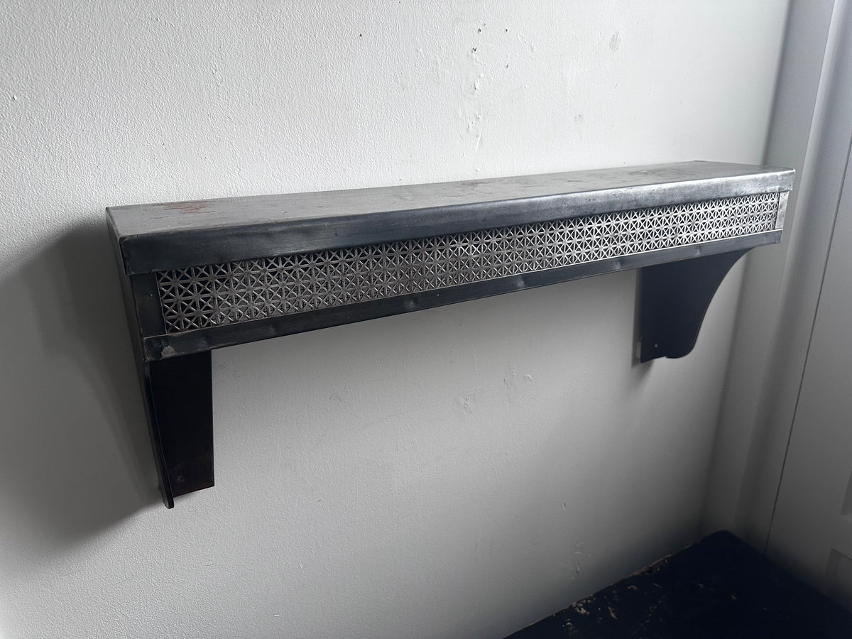 Stamped steel radiator shelf