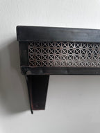 Stamped steel radiator shelf