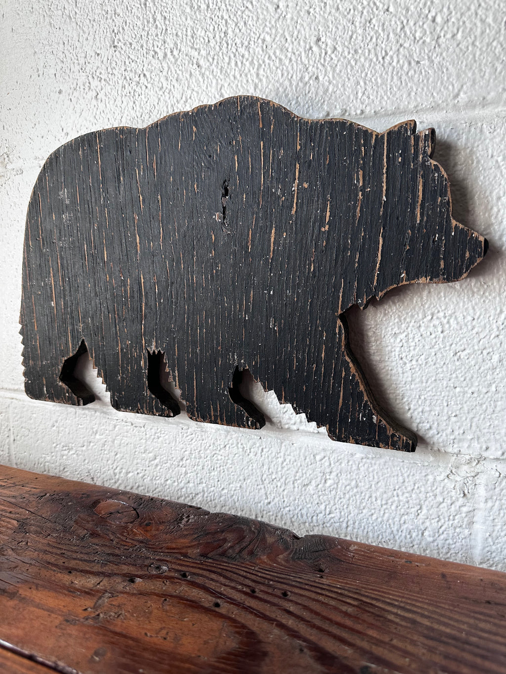 Wooden bear sign fragment