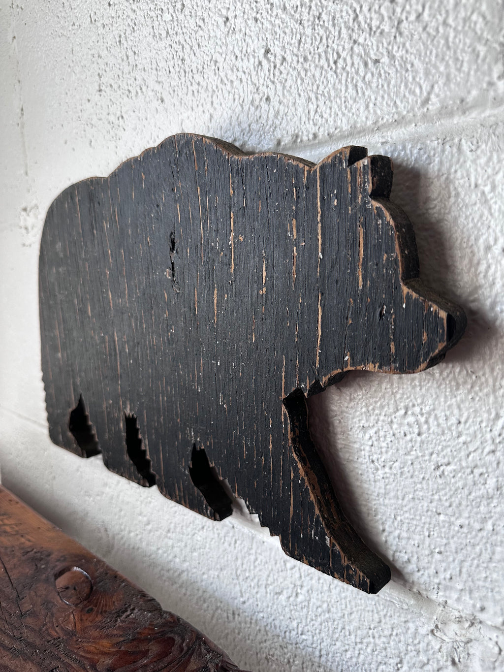 Wooden bear sign fragment